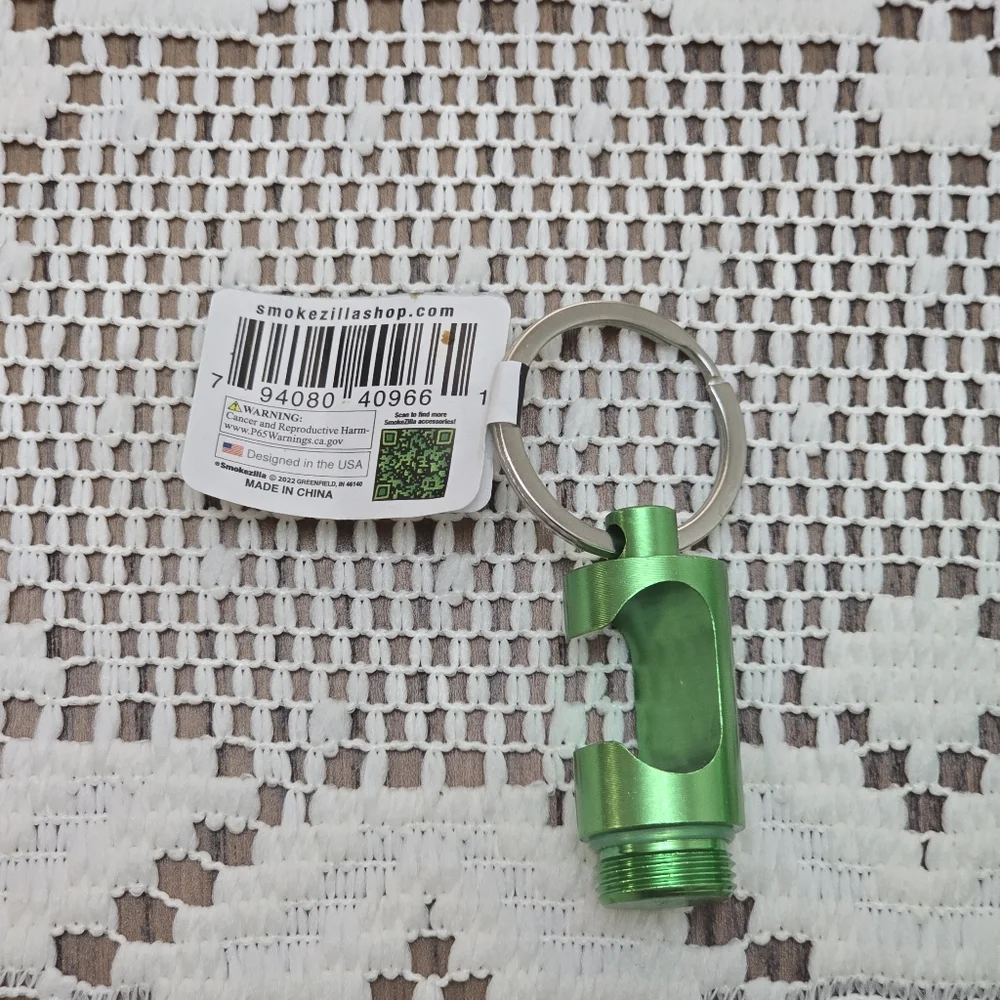 NWT Smokezilla Storage Tube Container Keychain with Bottle Opener Metallic Green